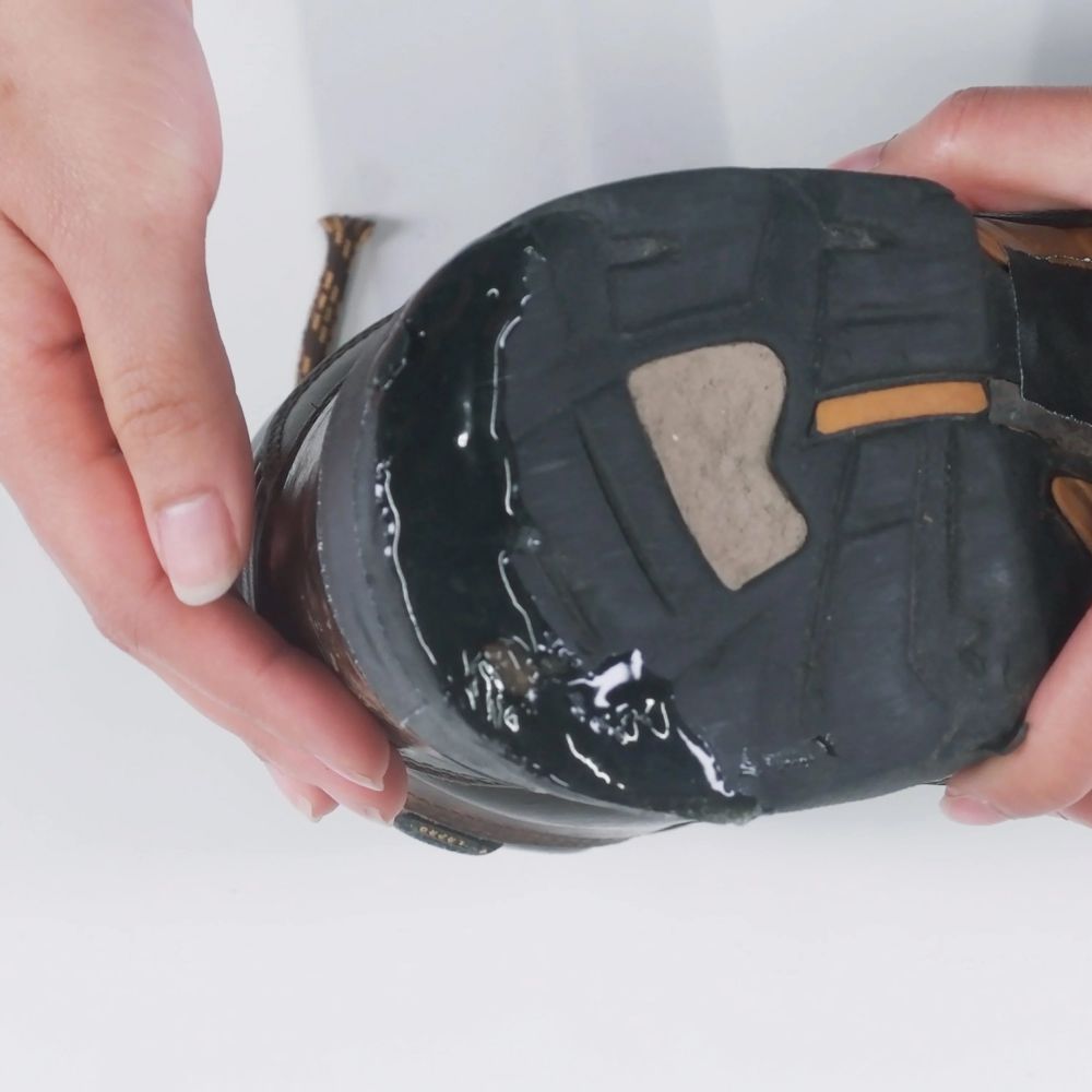 Gear Aid Aquasure SR Shoe Repair Adhesive showing results on heel