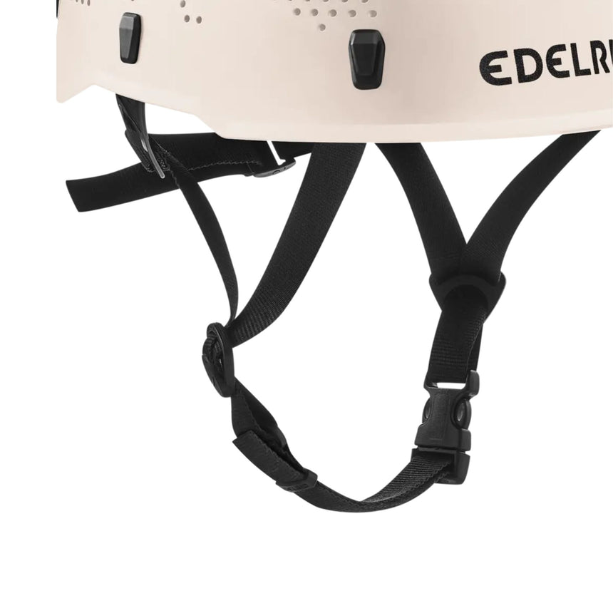 White Edelrid Ultralight Junior Helmet closeup of fully adjustable, replaceable, and washable head and chin strap for optimum fit