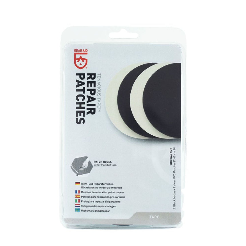 Gear Aid Tenacious Tape Repair Patches in Euro hook Packaing showing 2 black nylon and 2 clear pvc round patches (7.62 cm diameter)