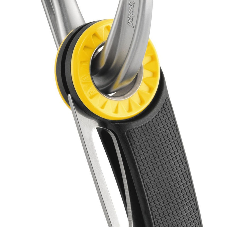 Close up of Carabiner hole on the Petzl Spatha Knife with a carabiner. Allowing the Petzl Spatha knife to be easily attached to a harness.