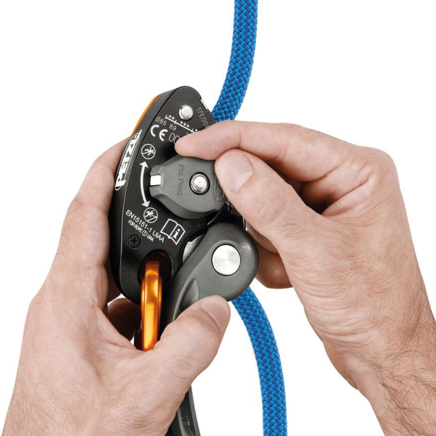 Professional showing top-rope or lead belay mode on the Petzl Grigri + is chosen with a selector knob.