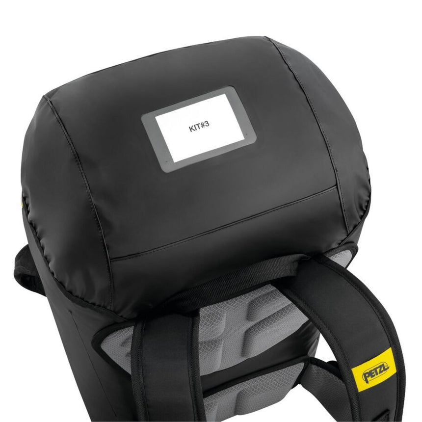 Petzl Transport 60 upper flap has a transparent pocket for identification and a closed pocket for personal items or small equipment.