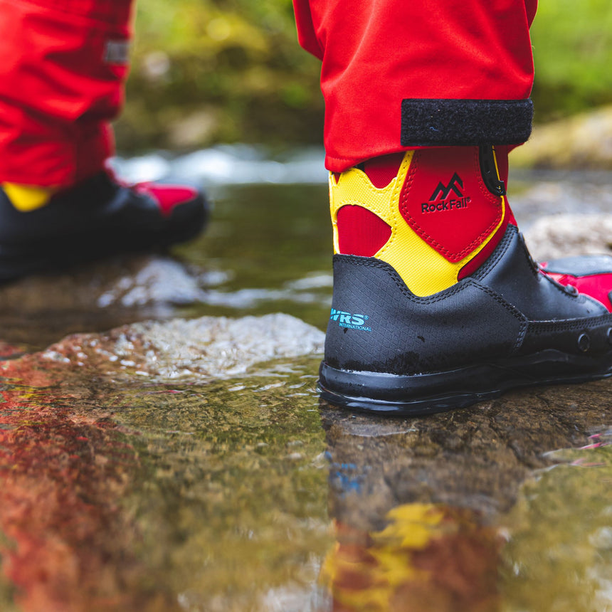 WRS Rescue Boots on person in still shallow water