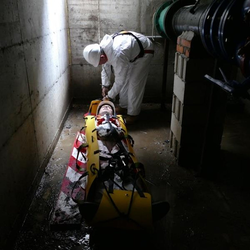 Kong Rolly - Rollable Stretcher showing use with patient in confined space