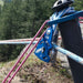 Rigging system using the SMC Apex Direct 1.5 pulley attached to multiple ropes and a rigging pole on a rocky outdoor landscape