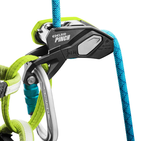 Edelrid Pinch Belay System in use with rope, webbed loops and a carabiner 