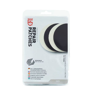 Gear Aid Tenacious Tape Repair Patches in Euro hook Packaing showing 2 black nylon and 2 clear pvc round patches (7.62 cm diameter) 
