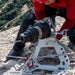 Professional installing Harken LokHead Winch onto Harken Tellumount winch on rocky mountain uneven ground 